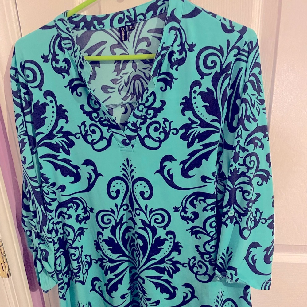 Size XL Teal color long 3/4 sleeve dressy shirt. Perfect with leggings